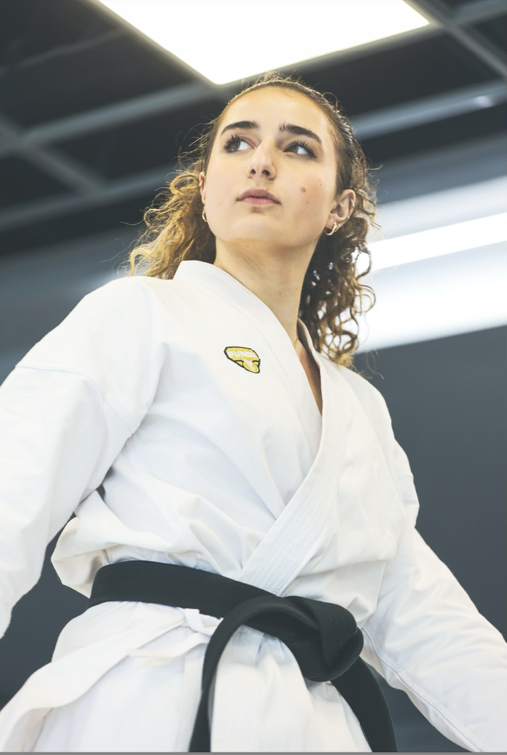 Dojo+Mojo%3A+Kaled+sports+her+PUNOK+uniform+in+a+promotional+shoot.+Because+of+Kaled%E2%80%99s+win+record%2C+she+receives+free+gear+as+compensation+for+wearing+their+merchandise+when+competing.+Photo+courtesy+of+Jesus+Larroche.